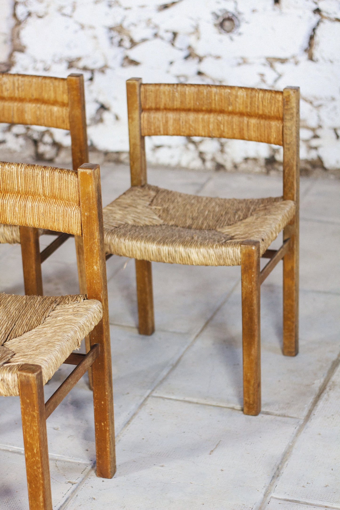 4 chaises en paille "Week-end" par Pierre Gauthier Delaye, 1950