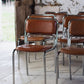 8 chaises tubulaires en chrome et skaï, 1970