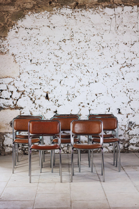 8 chaises tubulaires en chrome et skaï, 1970