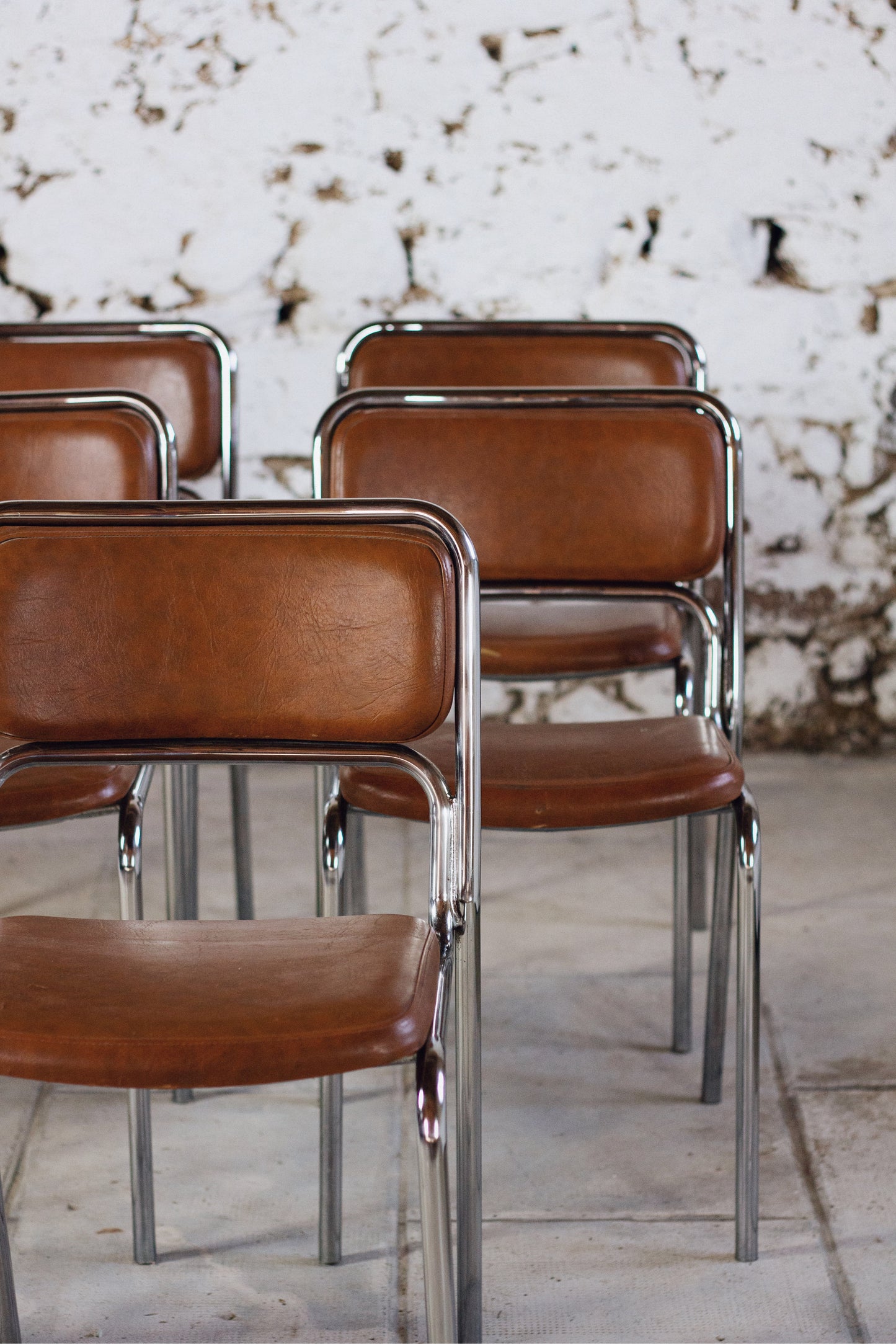 8 chaises tubulaires en chrome et skaï, 1970