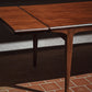 Table scandinave en teck avec rallonges par Johannes Andersen, 1960