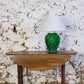 Lampe en faïence verte tressée