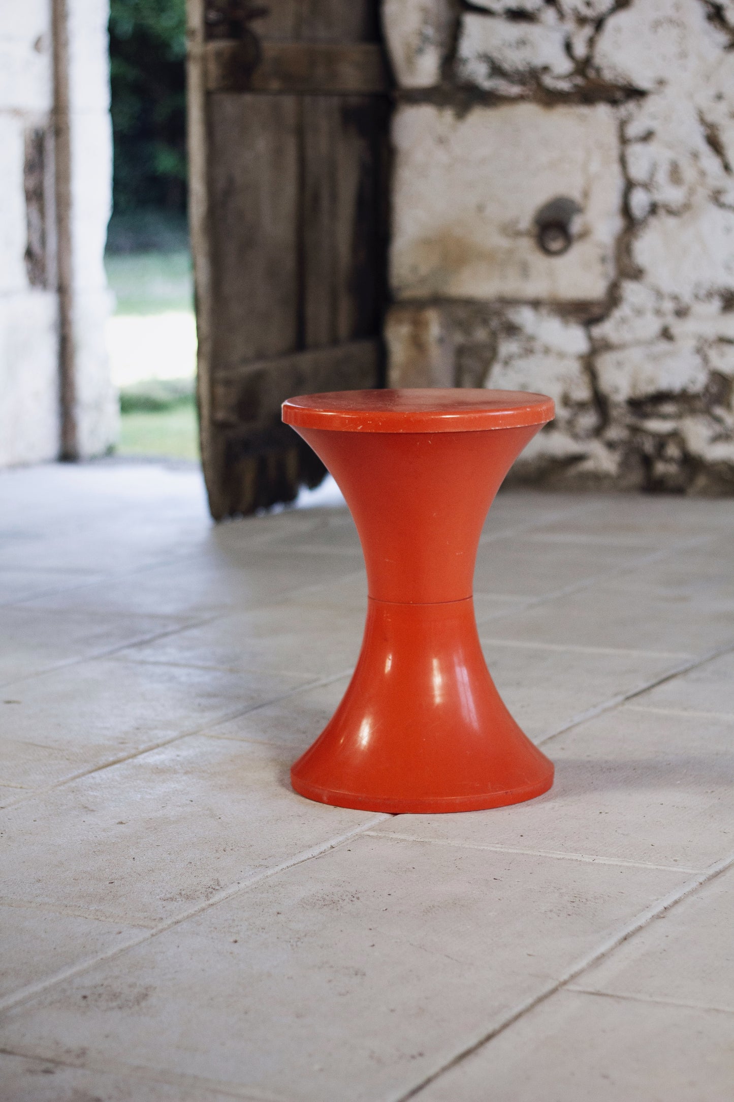 Tabouret Tam Tam orange foncé par Henri Massonnet pour Stamp, 1970