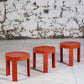 Trois tables gigognes en plastique orange par Prisunic, 1970