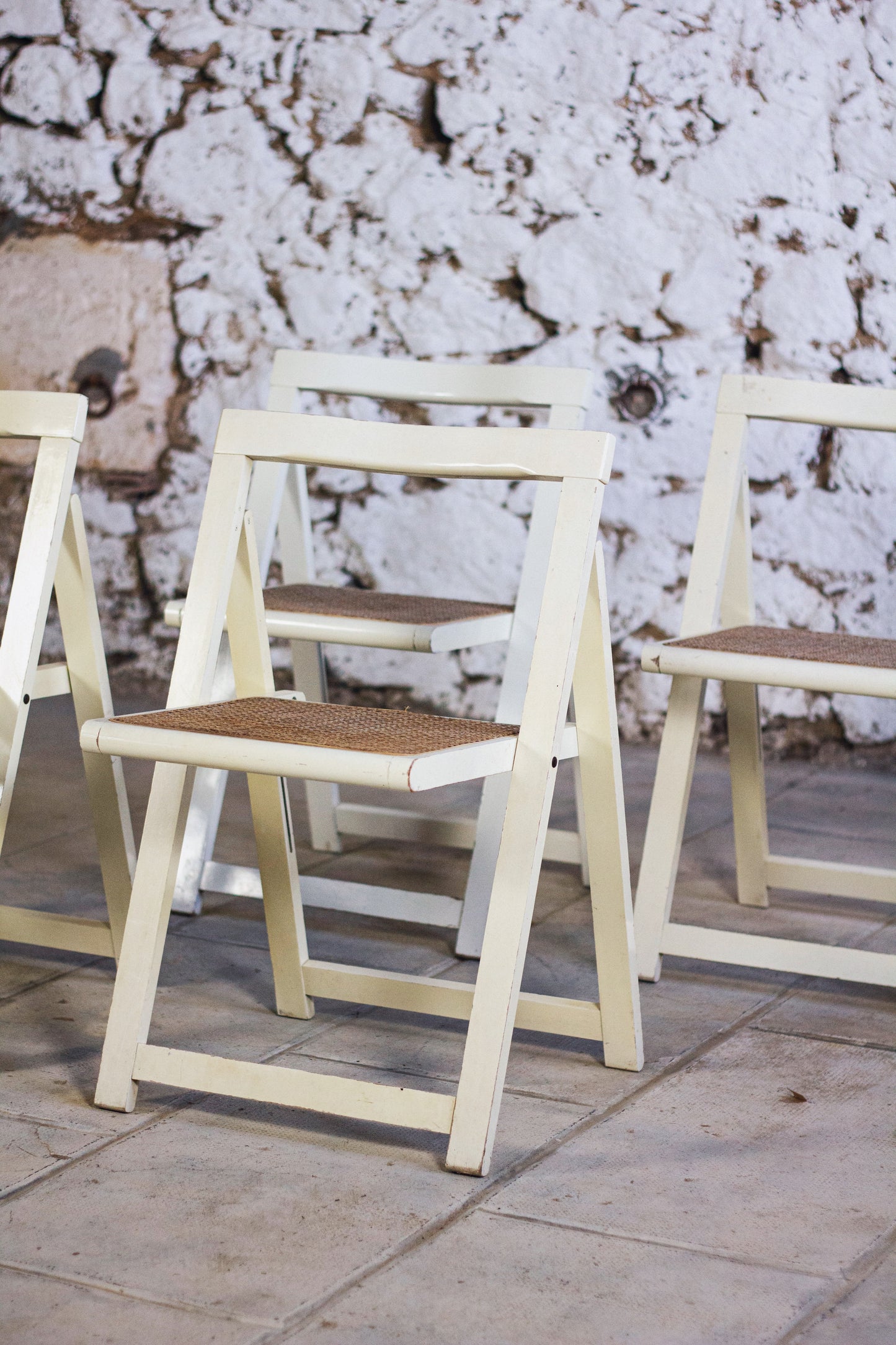 4 chaises pliantes en cannage style Aldo Jacober, 1960