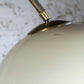 Lampadaire arc par Harvey Guzzini en laiton, 1970