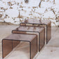 Trois tables gigognes en plexiglas fumé, 1970