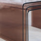Trois tables gigognes en plexiglas fumé, 1970
