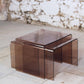 Trois tables gigognes en plexiglas fumé, 1970