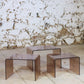 Trois tables gigognes en plexiglas fumé, 1970