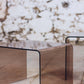 Trois tables gigognes en plexiglas fumé, 1970